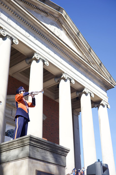 Members of the Syracuse University Marching Band trumpet section stand separated from the rest of the group on the sides of Hendricks Chapel. Taylor Fryer played his duet in “Feelin’ Good,” part of the band’s half halftime show, with Jose Suarez (not pictured) as the two stood on opposite sides of the chapel.