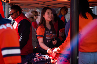 Many booths set up on the quad before the game in the hopes of enticing fans to purchase what they have to offer. Clothing tents were a popular spot for people looking to sport their orange at the game. 