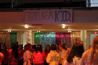 The Goldstein Auditorium in Schine Student Center is decorated in bright colors, tinsel and lights for the annual dance marathon. All of OttoTHON’s proceeds went to Upstate Golisano Children’s Hospital. 