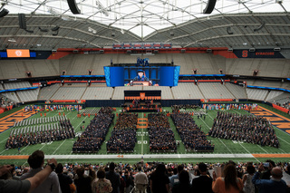The Class of 2023 concludes their tenure at Syracuse University at the annual commencement ceremony. The JMA Wireless Dome filled with parents, family, friends, professors as they came alongside the graduates to celebrate their achievements. 